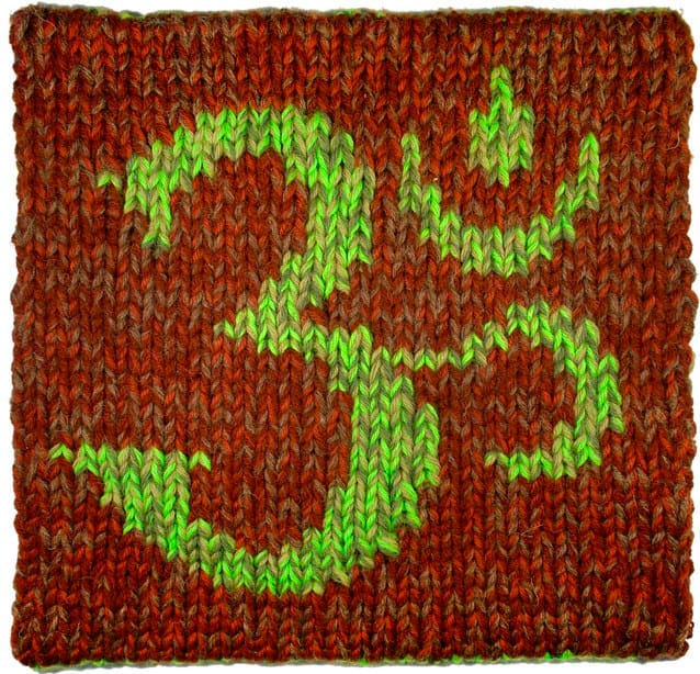 The Message - Knitted Aum Symbol