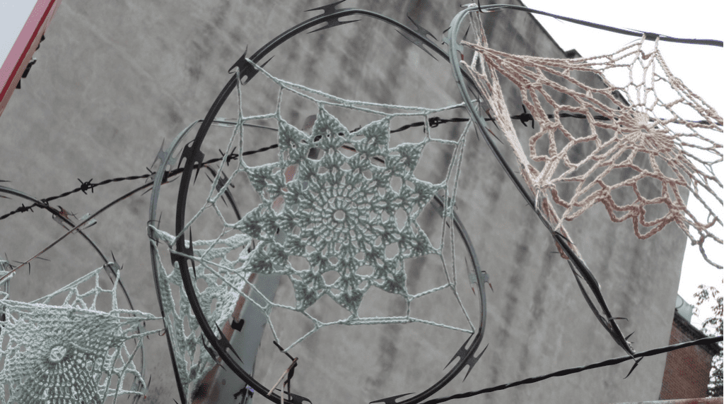Crochet Snowflake on Razor Wire - Proof of the Beauty in Contradictions