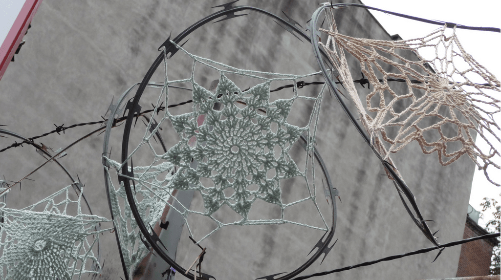 Crochet Snowflake on Razor Wire - Proof of the Beauty in Contradictions