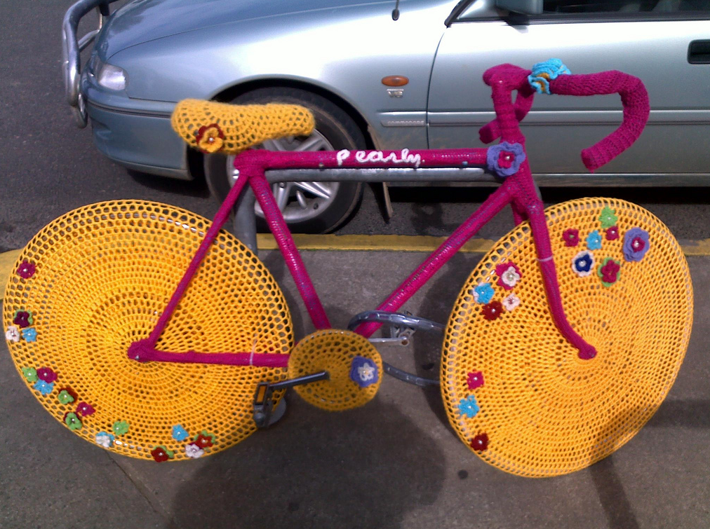 Bright and Spunky Pink and Yellow Yarn Bombed Bike