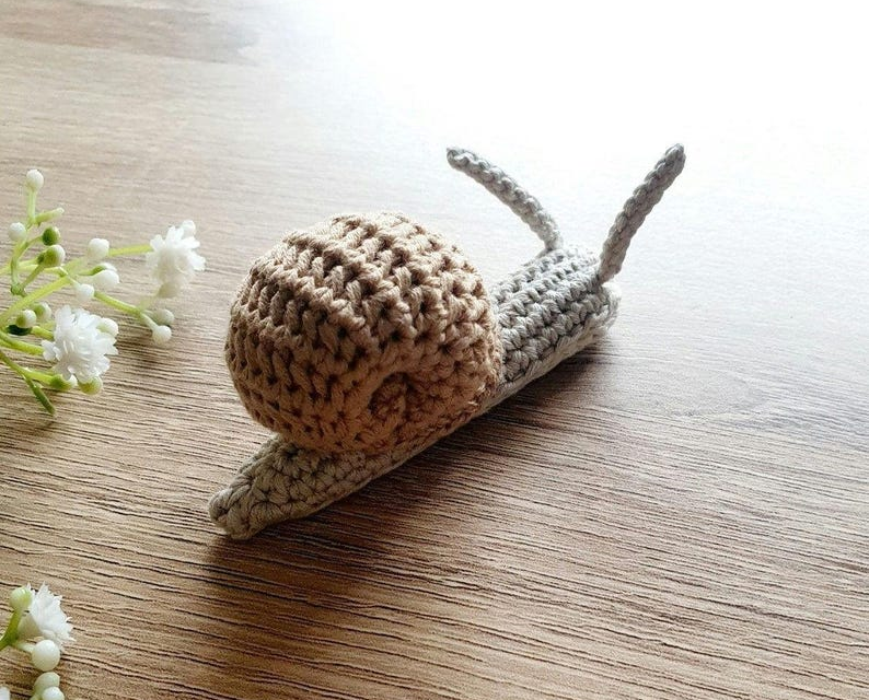 7 Quirky Cute Snail Patterns For Knitters & Crocheters