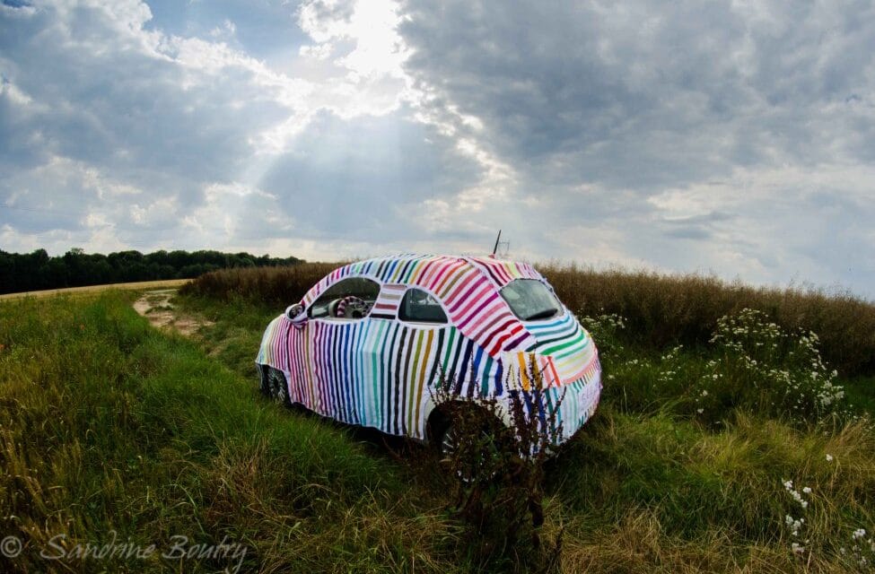 Sandrine Boutry’s #SecretStripyProject is … a Yarn Bombed Car, Inside and Out!