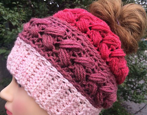 This Puffy Braids Messy Bun Hat by Jen Causley Uses Colorful Cake Yarn! Get the Pattern, So Fun – YUM!