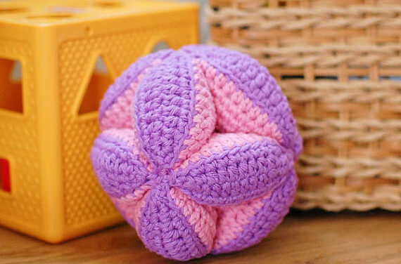 Looking For The Perfect Baby Gift? Crochet This Cute Clutch Toy!