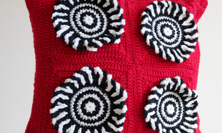 Crochet a Red Rum Cushion With This Pattern Designed By Leonie Morgan