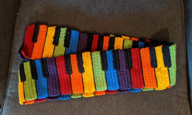 This Is What Happens When You Reimagine a Black & White Piano Scarf Pattern With a Rainbow Vibe