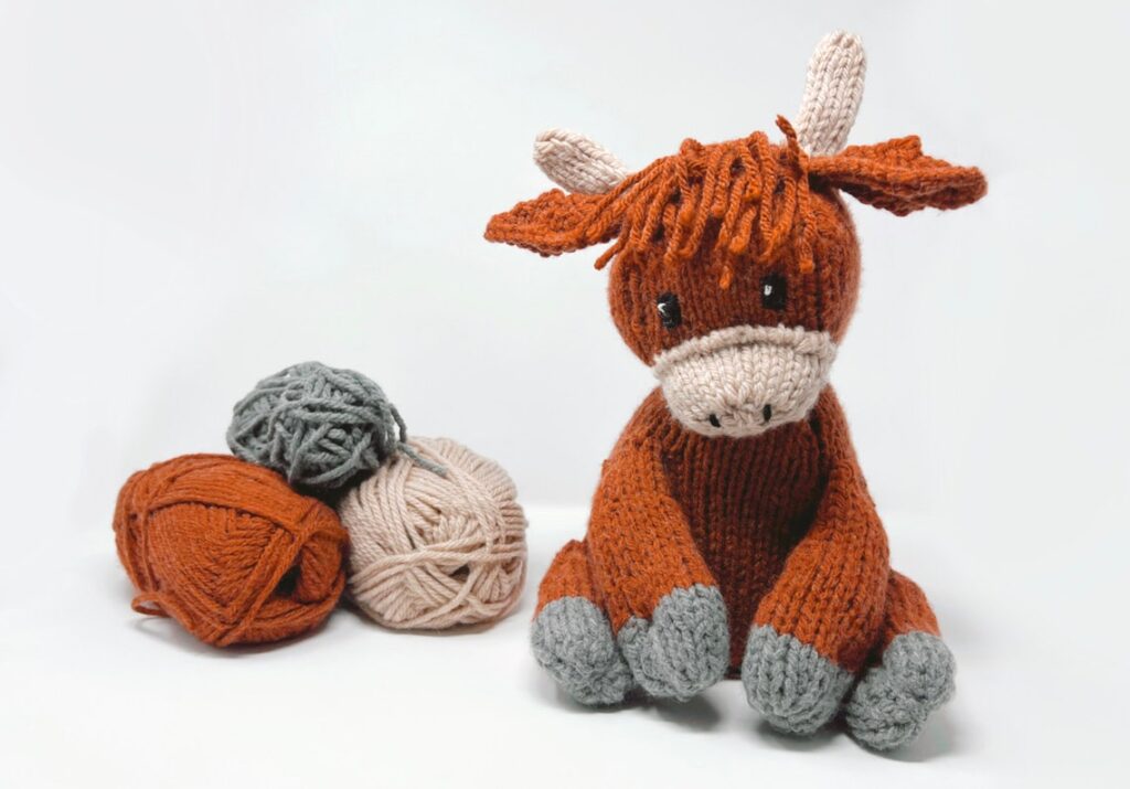 Knit a Highland Cow Amigurumi With a Pattern From Brown Paper Fox