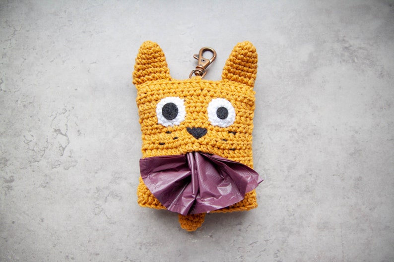 Crochet The Perfect Accessory For Any Dog Lover On Your List - An Amigurumi Poop Bag Holder!