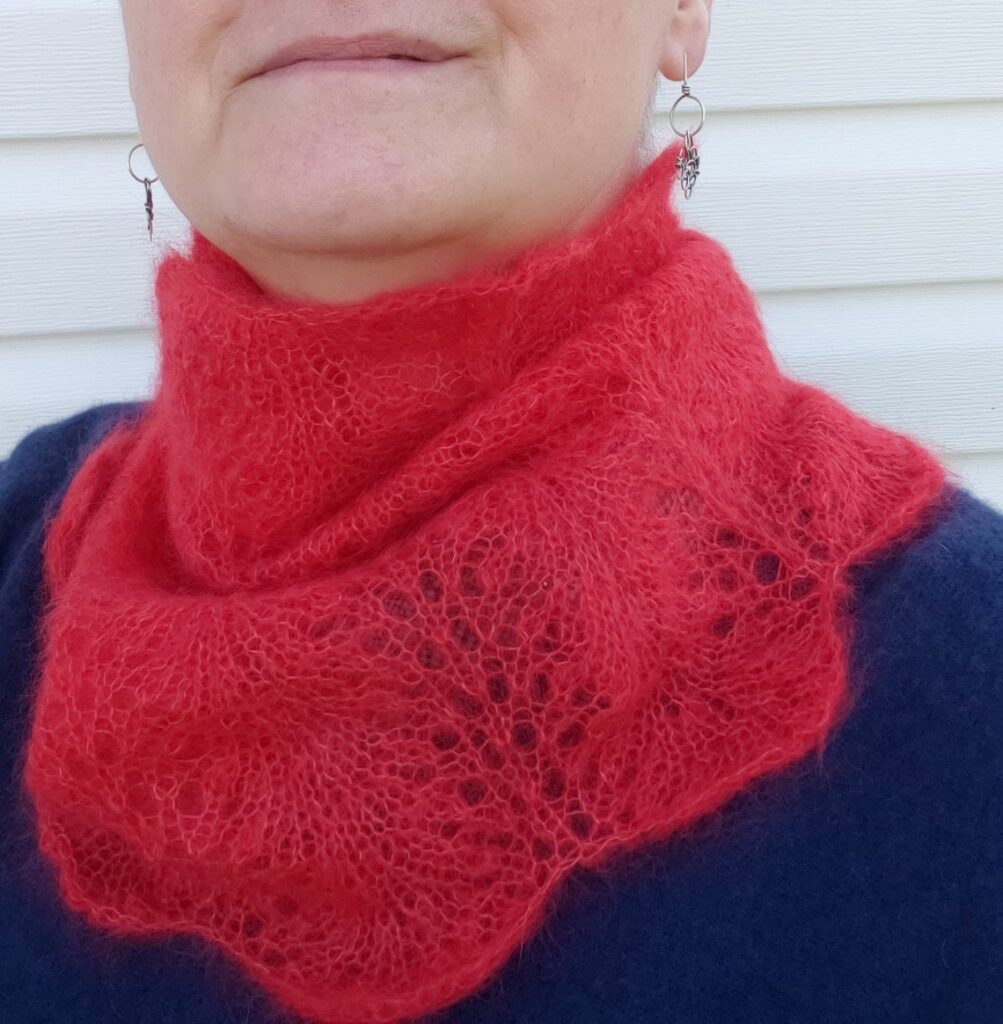 Knit a Delicate Feather and Fan Cowl Pattern Designed By The Knitted Raven