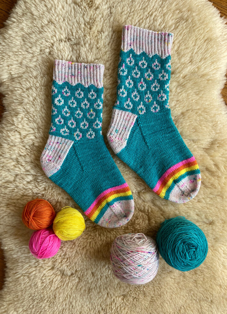 How Fun Are These Rainburst Socks Designed By Allison Lutes?!